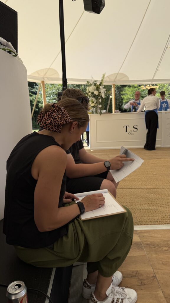 Natasha Spencer Weddings and Events  setting up at a wedding and running through timelines with suppliers